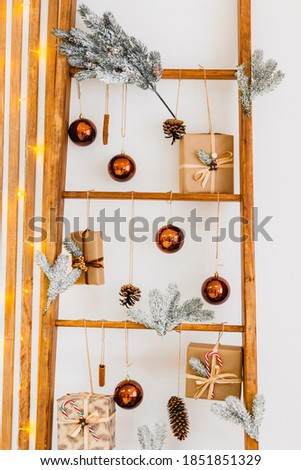 New Year's decor. New Year cards. tree made of wooden sticks. Christmas decorations