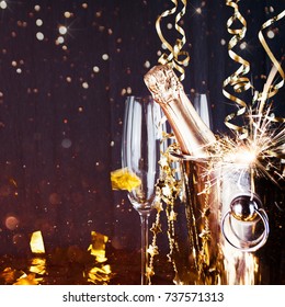 New Years Eve Celebration Background With Champagne. New Years Eve Celebration Background With Pair Of Flutes And Bottle Of Champagne 