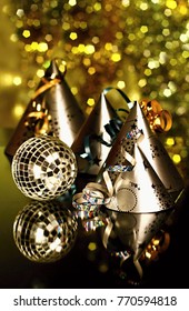 New years eve celebration with hats with lights in background no people stock photo
