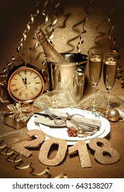 New Years Eve celebration. Holidays served table with champagne and decorations