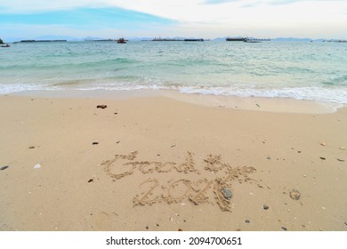 New Year's Eve Concept. Font Goodbye 2021 On The Beach At The Sea.