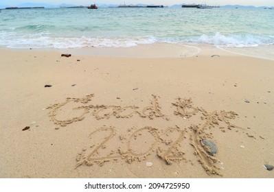 New Year's Eve Concept. Font Goodbye 2021 On The Beach At The Sea.