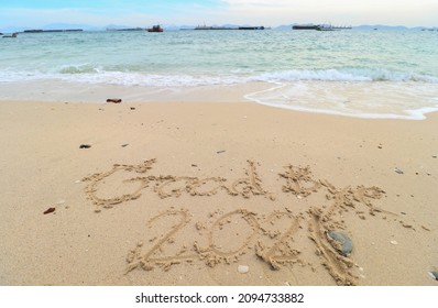 New Year's Eve Concept. Font Goodbye 2021 On The Beach At The Sea.