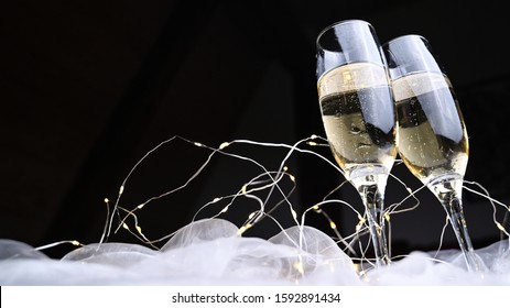 New Year's Eve Pour Champagne Into Glasses
