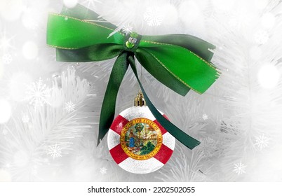 New Year's Glass Ball With The Flag Of State Of Florida Against A Colorful Christmas Background