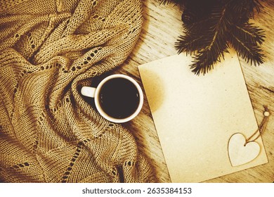 New year's goals notebook, blank, template to do list. Christmas decorations and warm plaid. Empty space for text. New year celebration and resolutions idea. Toned effect, retro style