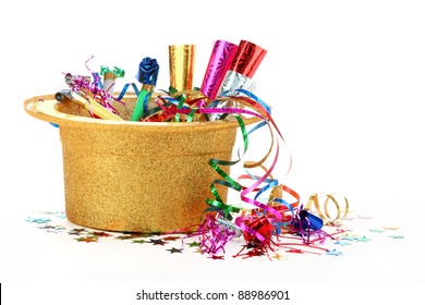 New Year's Hat Filled With Noise Makers, Streamers And Confetti On White Background.