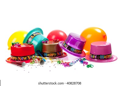 New Year's Hats, Noise Makers, Streamers, Balloons And Confetti On A White Background