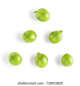 New Year`s tree of green peas on isolated white background - Shutterstock ID 718953820