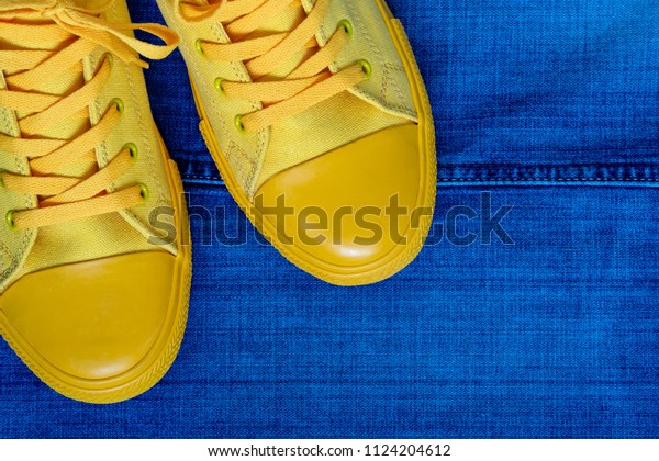blue and yellow gym shoes
