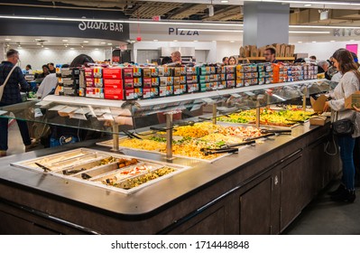 NEW YORK 18, October 2018: food bar in Whole Foods Supermarket, New York, USA. Whole Foods is a very popular supermarket with healthy food.