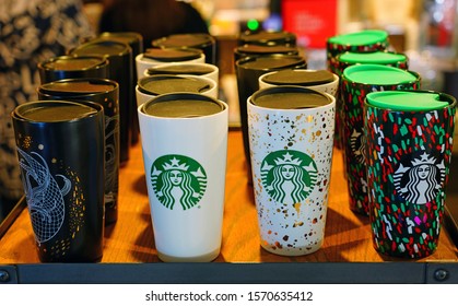 NEW YORK -23 NOV 2019- The Starbucks 2019 Holiday Mugs On A Shelf At A Starbucks Coffee Shop.