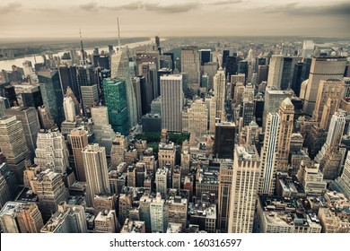 New York. Aerial View Of Bryant Park And Midtown Skyscrapers At Summer Sunset.