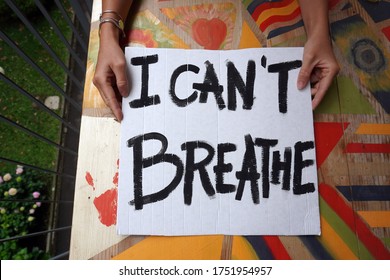 New York America USA June 2020 - White Latin Girl Holding Sign I Can't Breathe Protest And Manifest After The Killing Of George Floyd By The American Police - Racism And Social Violence               