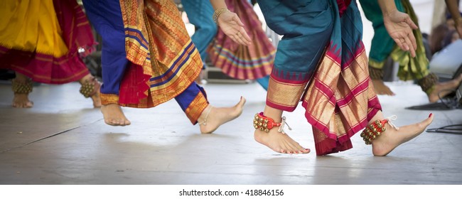 NEW YORK - APR 30 2016: Ghungroo bells on the feet of dancers from NYC Bhangra performing on stage in traditional clothes at the Holi Hai Festival of Colors in New York on April 30 2016.