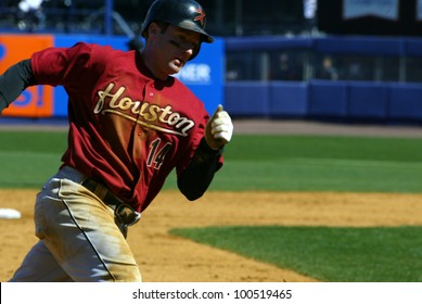 NEW YORK - APRIL 11: Morgan Ensberg #14 of the Houston Astros runs around third base at Shea Stadium April 11, 2005 in Flushing, New York