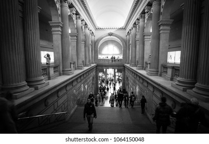 NEW YORK, NEW YORK - APRIL 5, 2018: Visitors Walking Up The Stairs Of The Metropolitan Museum Of Art In New York City