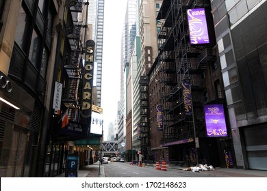 New York, New York - April 5, 2020: Evening View Of Broadway Area In Manhattan, Empty And Void Of Tourists; Cinemas, Theaters, And Businesses Have Been Shut Down To Prevent The Spread Of COVID-19.