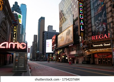 New York, New York - April 5, 2020: Evening View Of Times Square Area In Manhattan, Empty & Void Of Tourists; As Businesses Have Been Shut Down To Prevent The Spread Of COVID-19.