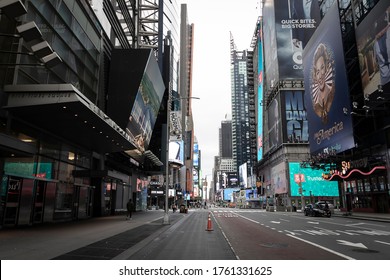 New York, New York - April 5, 2020: Evening View Of Times Square Area In Manhattan, Empty & Void Of Tourists; As Businesses Have Been Shut Down To Prevent The Spread Of COVID-19.