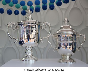 NEW YORK - AUGUST 22, 2019: US Open Men's And Women's Singles Trophies On Display During 2019 US Open Tournament At Billie Jean King National Tennis Center