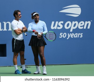 NEW YORK - AUGUST 23, 2018: Grand Slam Champion Serena Williams Talks With Her Coach Patrick Mouratoglou During Practice At The 2018 US Open At Billie Jean King National Tennis Center