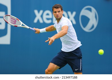 NEW YORK - AUGUST 23: Professional tennis player Grigor Dimitrov from Bulgaria practices for US Open 2014 at Billie Jean King National Tennis Center on August 23 , 2014 in New York 