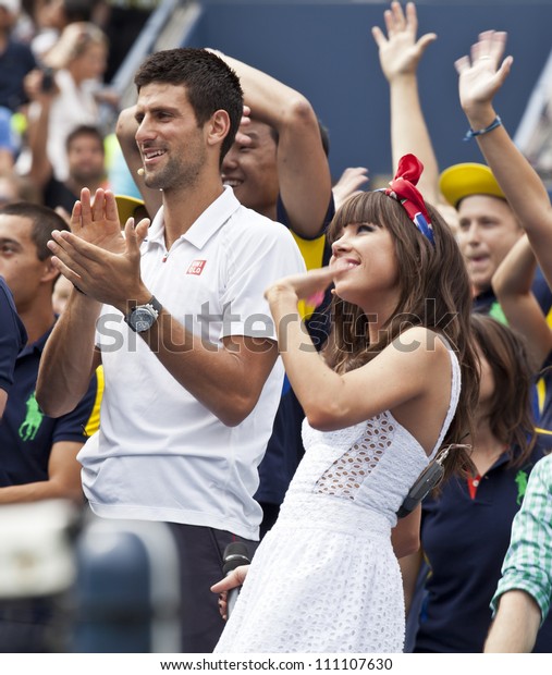 NEW YORK - AUGUST 25: Carly Rae\
Jepsen and Novak Djokovic attend Kids Day at US Open tennis\
tournament sponsored by Hess on August 25, 2012 in Queens New\
York