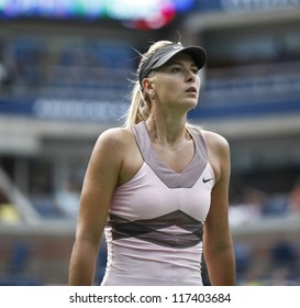 NEW YORK - AUGUST 27: Maria Sharapova of Russia reacts during 1st round match against Melinda Czink of Hungary at US Open tennis tournament on August 27, 2012 in Flushing Meadows New York