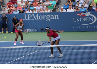 NEW YORK -  AUGUST 28: Grand Slam Champions Serena Williams And Venus Williams During Doubles Match At US Open 2014 At National Tennis Center On August 28, 2014 In New York 