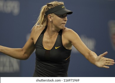 NEW YORK - AUGUST 29: Maria Sharapova of Russia returns ball during 2nd round match against Lourdes Dominguez Lino of Spain at US Open tennis tournament on Augist 29, 2012 in Flushing Meadows New York