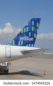 NEW YORK- AUGUST 3, 2019: JetBlue Plane Tail Fin At John F Kennedy International Airport In New York