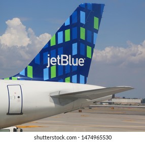 NEW YORK- AUGUST 3, 2019: JetBlue Plane Tail Fin At John F Kennedy International Airport In New York