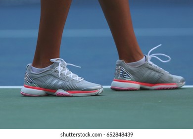 NEW YORK - AUGUST 30, 2016: Professional Tennis Player Kateryna Kozlova Of Ukraine Wears Custom Adidas By Stella McCartney Tennis Shoes During Match At US Open 2016 