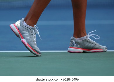 NEW YORK - AUGUST 30, 2016: Professional Tennis Player Kateryna Kozlova Of Ukraine Wears Custom Adidas By Stella McCartney Tennis Shoes During Match At US Open 2016 