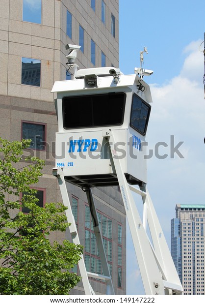 NEW YORK -
AUGUST 6: NYPD on high alert after terror threat in New York City
on August 6, 2013. NYPD Sky Watch platform providing security in
World Trade Center area of  Manhattan
