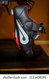 New York - Circa 2022: Peloton Fitness Brand Cycling Shoes On Back Of Flagship Stationary Bike For Fitness And Exercise