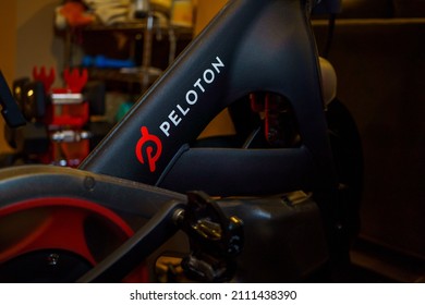 New York - Circa 2022: Peloton Logo On The Base Of Flagship Stationary Exercise Bike Setup For Fitness Riding Use