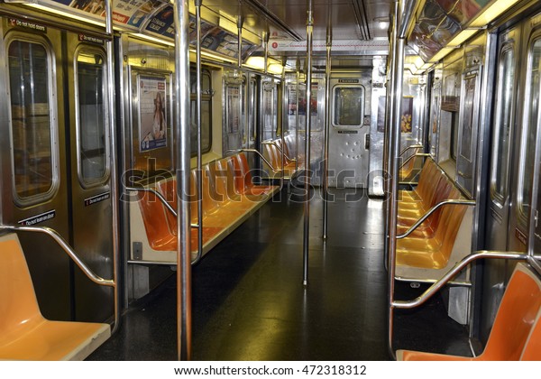 NEW YORK - CIRCA AUGUST 2016. As temperatures\
rise in summer, many passengers are avoiding subway cars without\
functioning air conditioning and opting for taxis or Uber rides\
instead.