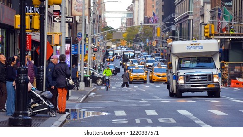 NEW YORK CIRCA NOVEMBER 2018. Despite Being A Weekend Afternoon, The Streets Of Manhattan Are As Congested As Weekday Rush Hour With Tourists, Locals And A Myriad Of Vehicles Adding To Gridlock