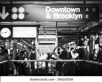 New York CIRCA OCT 2014 - saxophonist plays jazz music in the subway station in NYC. 