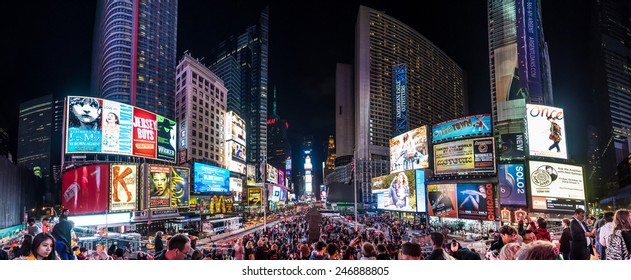 NEW YORK - CIRCA OCT, 2014: Night traffic across Times square in New York City in a panoramic 180Â° view. Times Square is the most visited tourist attraction in the world.