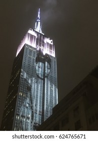 New York City - 19 April 3017: Images Projected On The Side Of The Empire State Building At Night To Celebrate The 150th Anniversary Of Harper's Bazaar Magazine.