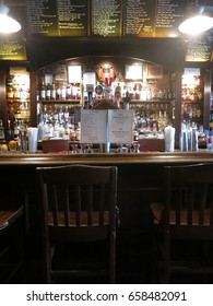 New York City - 26 August 2015: Bar Specials And Beers Taps At Whiskey Ward, Local Bar On The Lower East Side In Manhattan. Empty Dive Bar With Old Speckled Hen, Guinness, Victory, And Alagash On Tap.