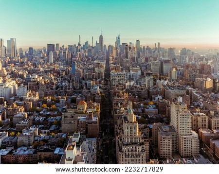 New York City 5th Avenue, famous shopping destination. Cityscape view of Manhattan skyscrapers, morning light, aerial view