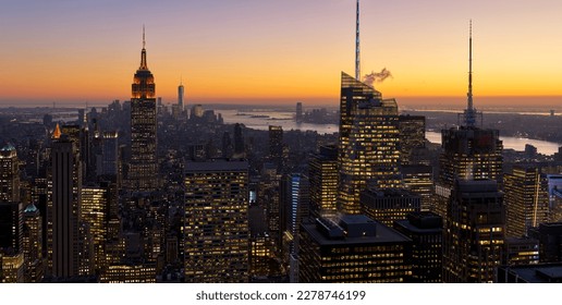 New York City aerial view of midtown Manhattan skyscrapers and Hudosn River at sunset - Shutterstock ID 2278746199