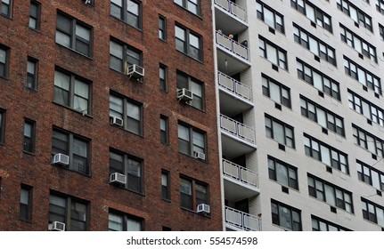 New York City Apartment Building Exteriors, One White Brick The Other Brown.