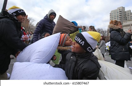NEW YORK CITY - APRIL 1 2017: More than one hundred New Yorkers gathered at Washington Square Park for the 12th annual Pillow Fight to benefit NYC homeless shelters