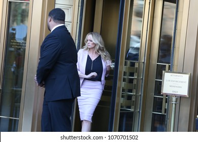 NEW YORK CITY - APRIL 16 2018: Donald Trump's personal attorney, Michael Cohen & adult film star, Stormy Daniels appeared in federal court in Lower Manhattan. Stormy Daniels leaves court after hearing