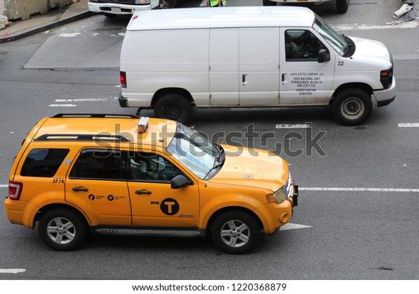 NEW YORK CITY - AUGUST 9, 2018: New York City\
Taxi in Manhattan. New York City has around 6,000 hybrid taxis,\
representing almost 45 of the taxis in service, the most in any\
city in North America